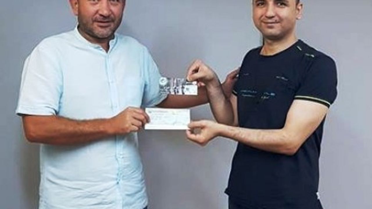 Büyük ikramiye talihlisine teslim edildi