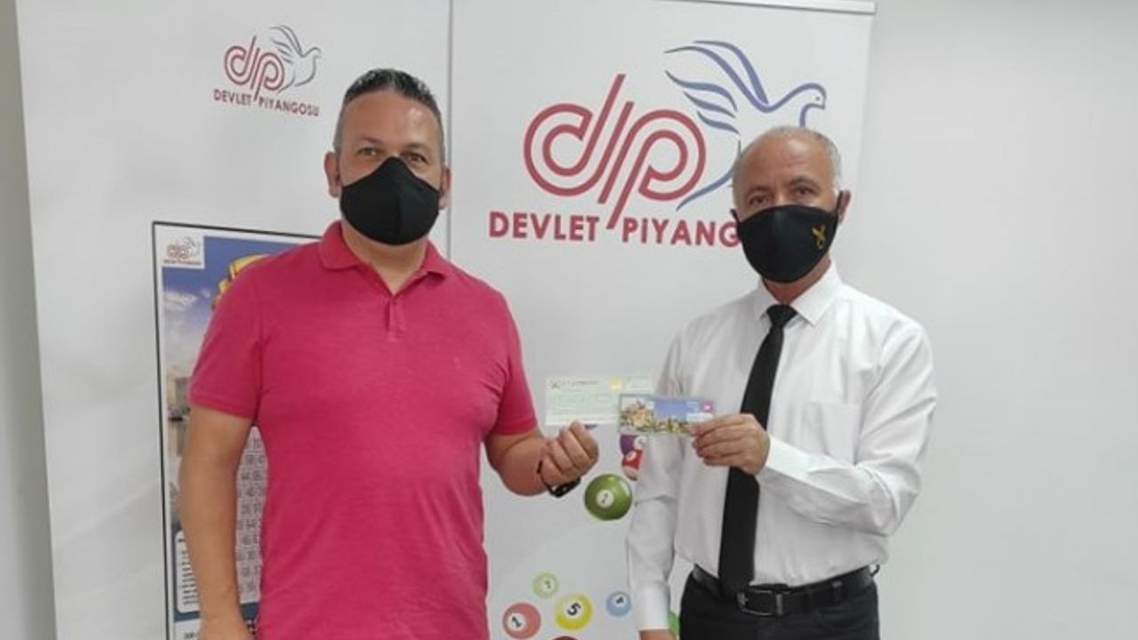 Büyük ikramiyenin talihlisi ikramiyesini teslim aldı